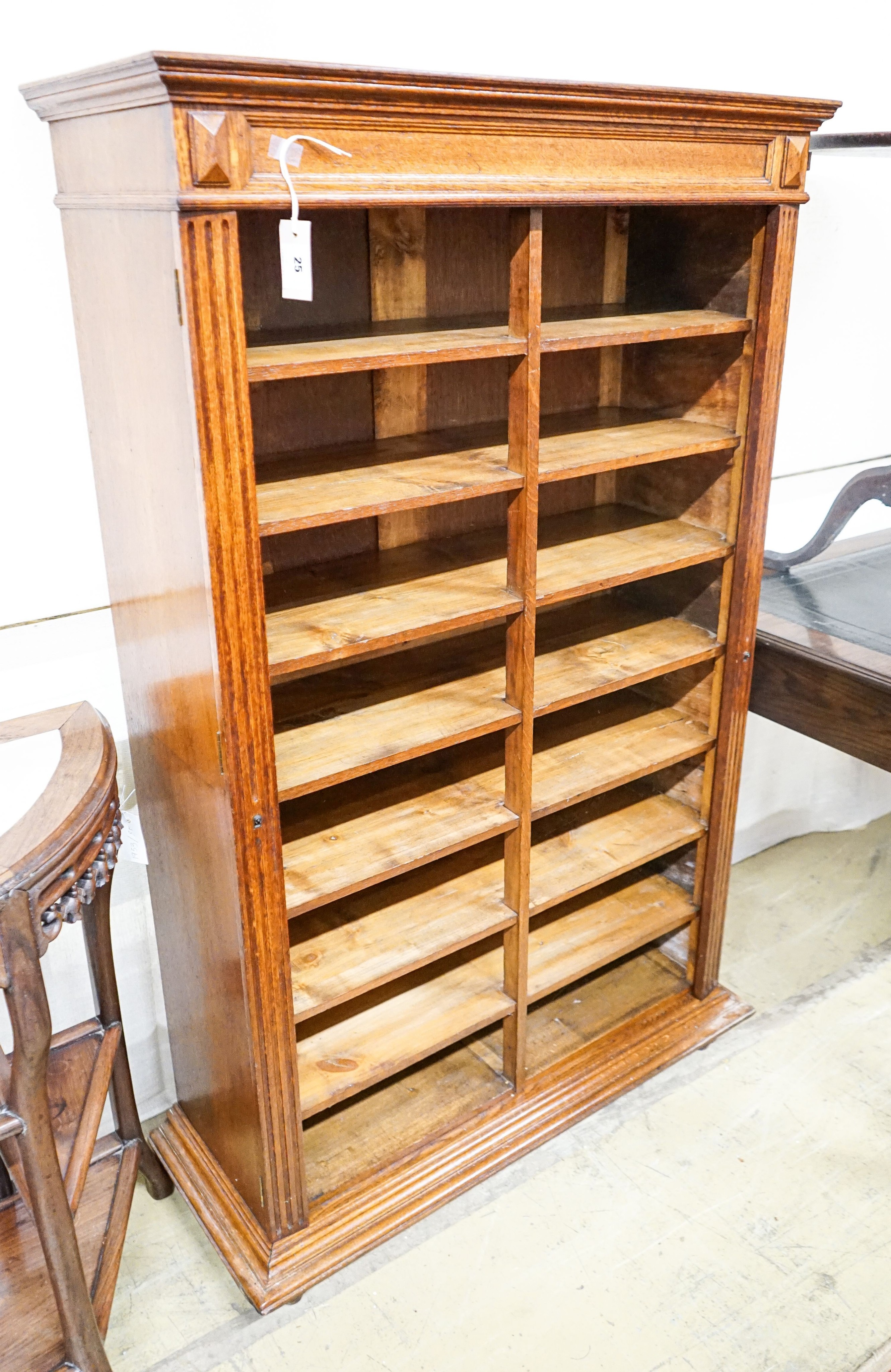 An early 20th century oak sixteen division office cabinet, W.92cm D.36cm H.150cm